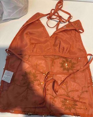 Top vintage anaranjado con lentejuelas