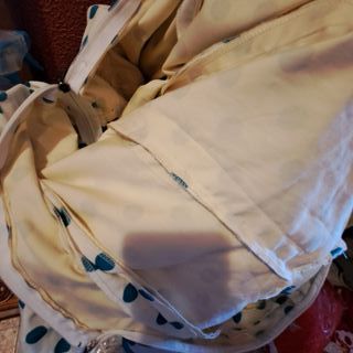 Vestido de flamenca en blanco y lunar azul turques