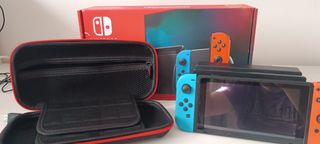 Nintendo Switch con giochi e custodia 
