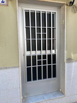 Puerta aluminio cristal blindada