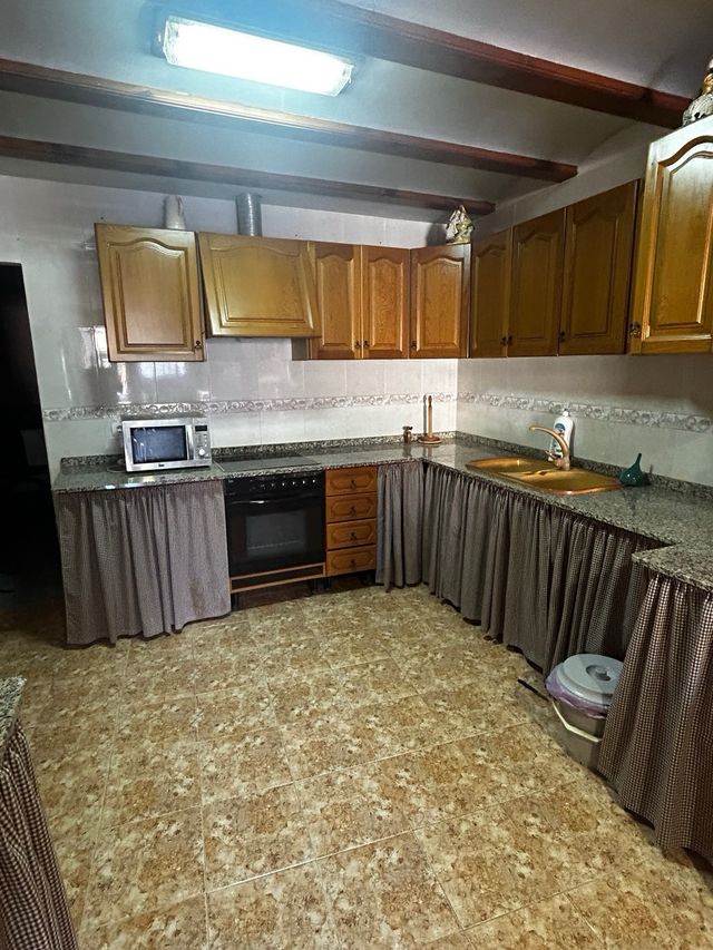 Planta baja con vivienda