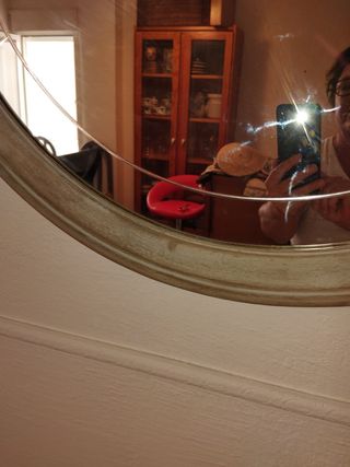 Antiguo espejo redondo