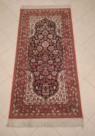 Alfombra vintage roja y marrón