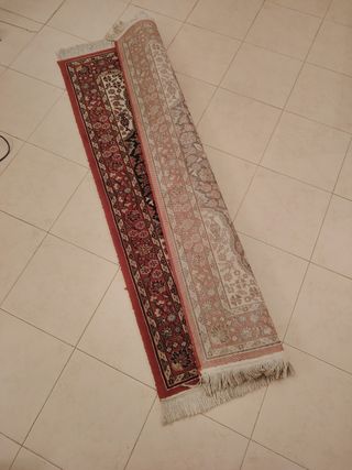 Alfombra vintage roja y marrón