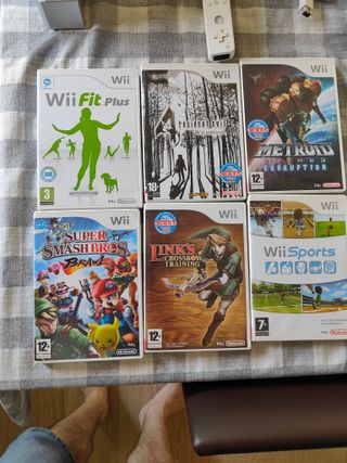 Nintendo Wii + Wii Fit + Juegos