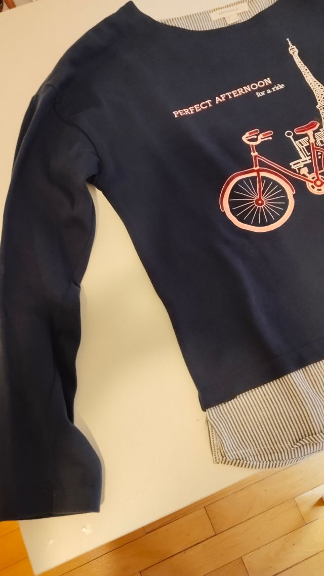 Sudadera azul niña bici París