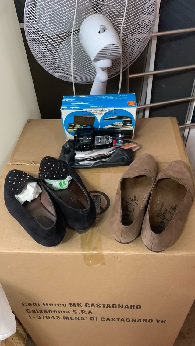 Scarpe da donna: nere e marroni Ferro da viaggio