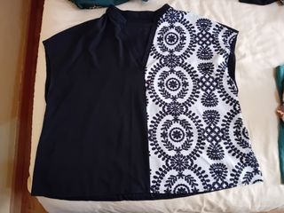 Blusa negra y blanca sin mangas