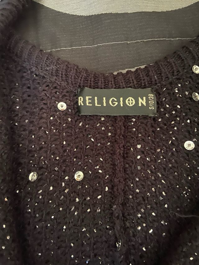 Chaqueta negra con lentejuelas plateadas