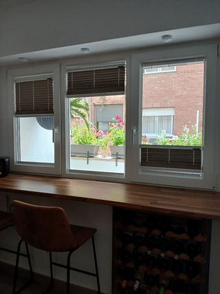 Tre tende plissettate grigie