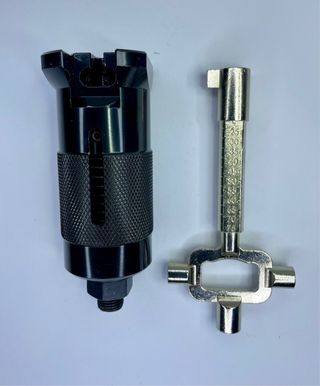 Extractor de bombines con llave de leva