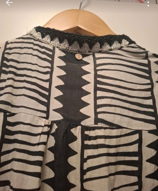 Vestido Lola Casademunt blanco y negro y pedreria