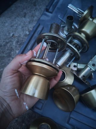 Juego 5 pomos puerta dorados