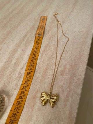 Collana con fiocco oro, bigiotteria