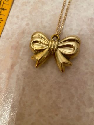 Collana con fiocco oro, bigiotteria