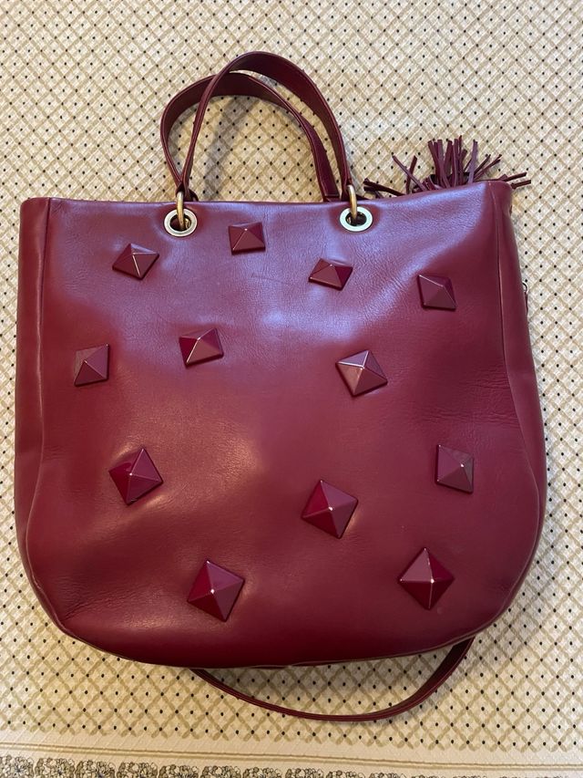 Borsa a mano in pelle rossa, e a tracolla