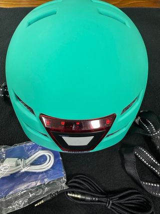 Casco bici/patinete LED turquesa