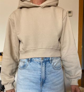 Sudadera beige Destination capucha