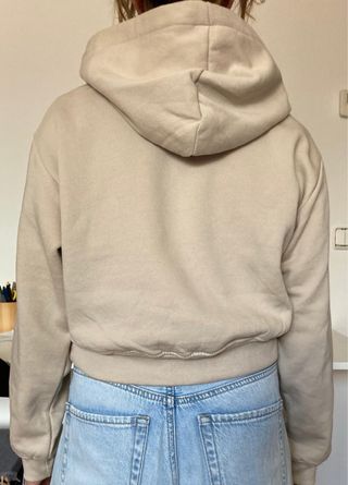 Sudadera beige Destination capucha