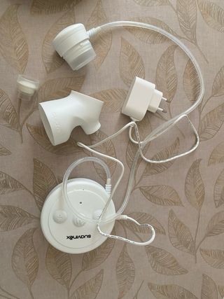 Sacaleches Suavinex eléctrico y discos lactancia