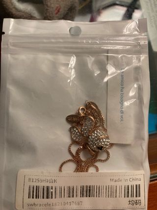 Collana con ciondolo a forma di pesciolino 