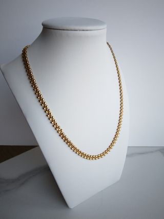 Collar de eslabones en forma de espiga.