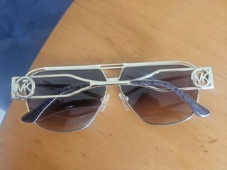 Gafas sol Michael Kors doradas