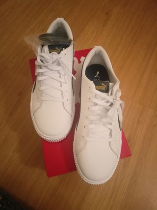 Zapatillas Puma blancas y azules