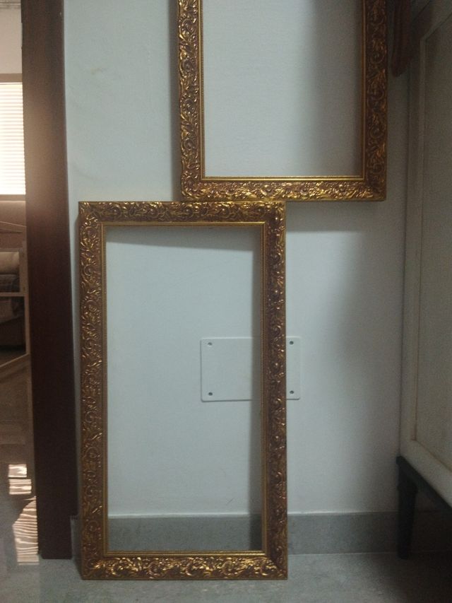 Pareja de cuadros dorados