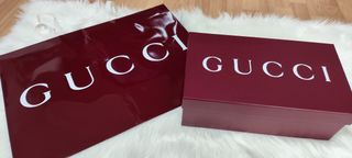 Caja y bolsa Gucci