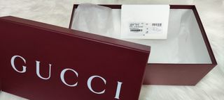 Caja y bolsa Gucci
