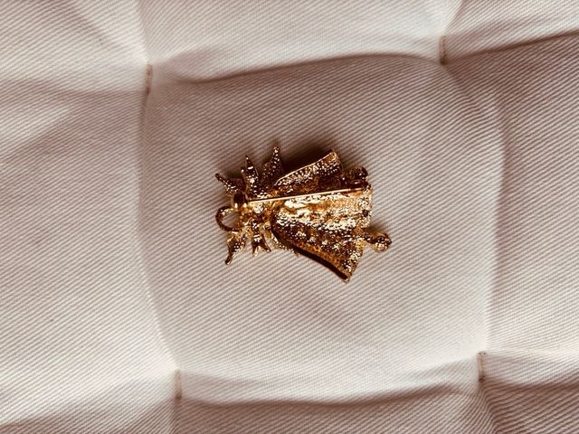 Broche Navidad dorado y rojo