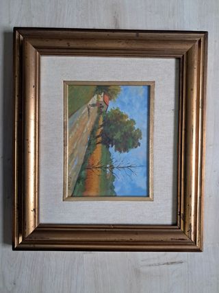 Quadro con cornice dorata