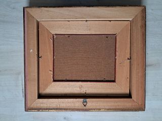 Quadro con cornice dorata