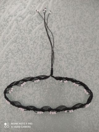 Choker nero intrecciato con perline
