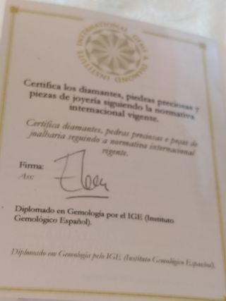 Sortija de oro de 1 ley con diamantes