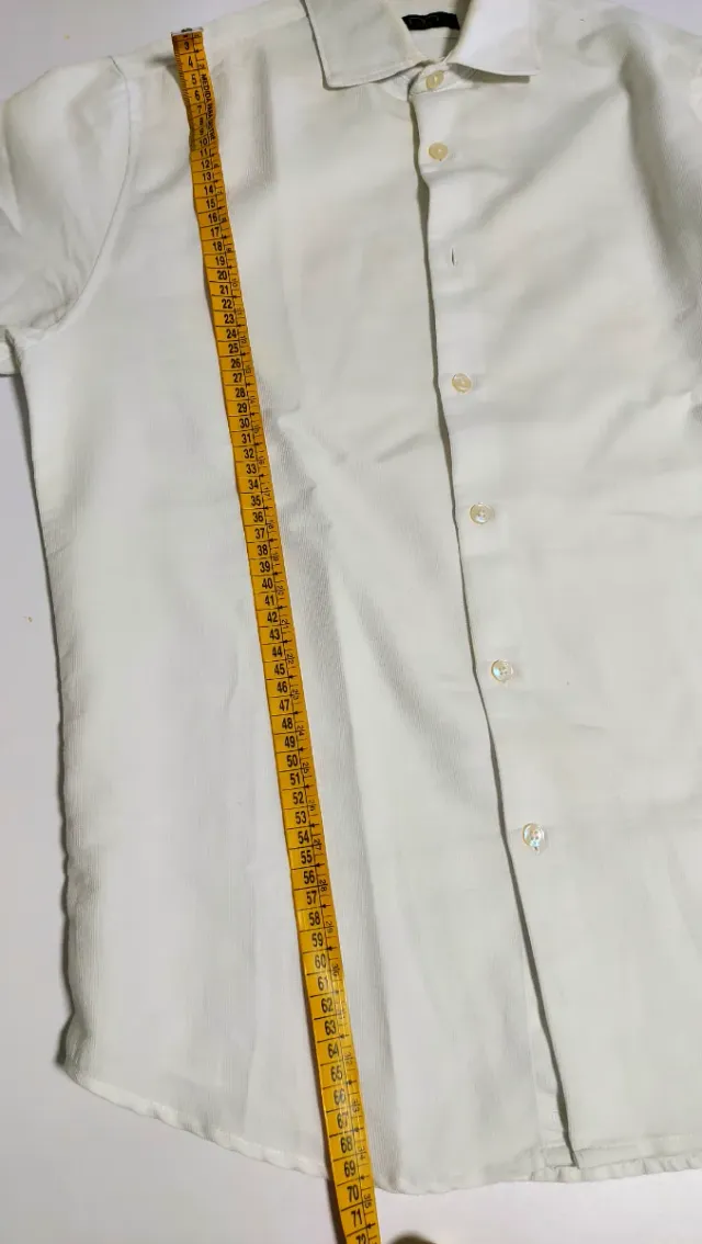 Camisa blanca manga larga hombre