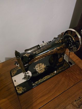 Máquina coser Singer antigua con mueble