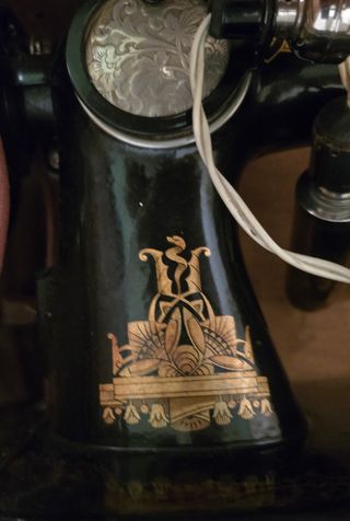 Máquina coser Singer antigua con mueble