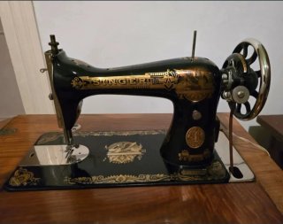 Máquina coser Singer antigua con mueble