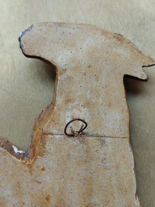 * Figura antigua en relieve de arte étnico