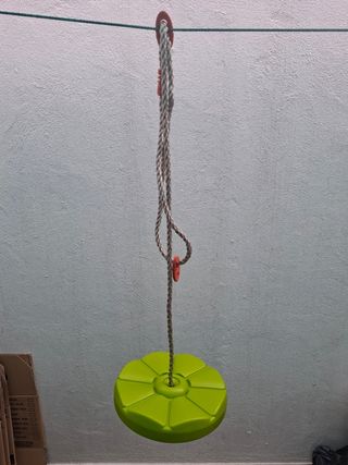 Columpio disco infantil.
