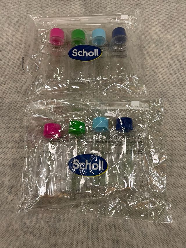 2 Set da 4 flaconi viaggio con borsello e imbutino