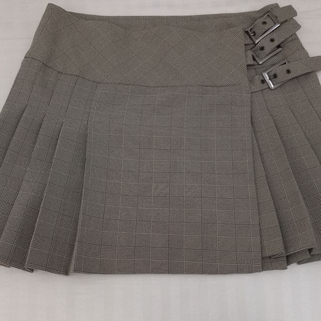 Falda escocesa marrón gris. MANGO.