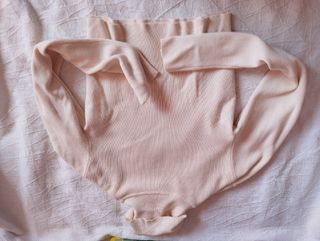 Jersey cuello alto beige