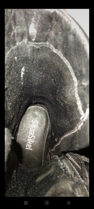 Stivali stringati neri borchie