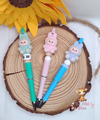 Llaveros y bolígrafos Labubu