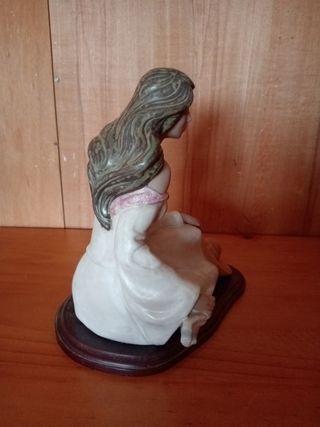 Muñeca cerámica sentada