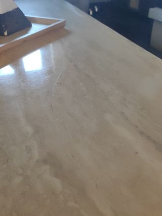 Mesa centro mármol travertino.

