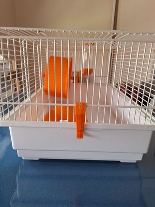 Jaula hamster naranja y blanca